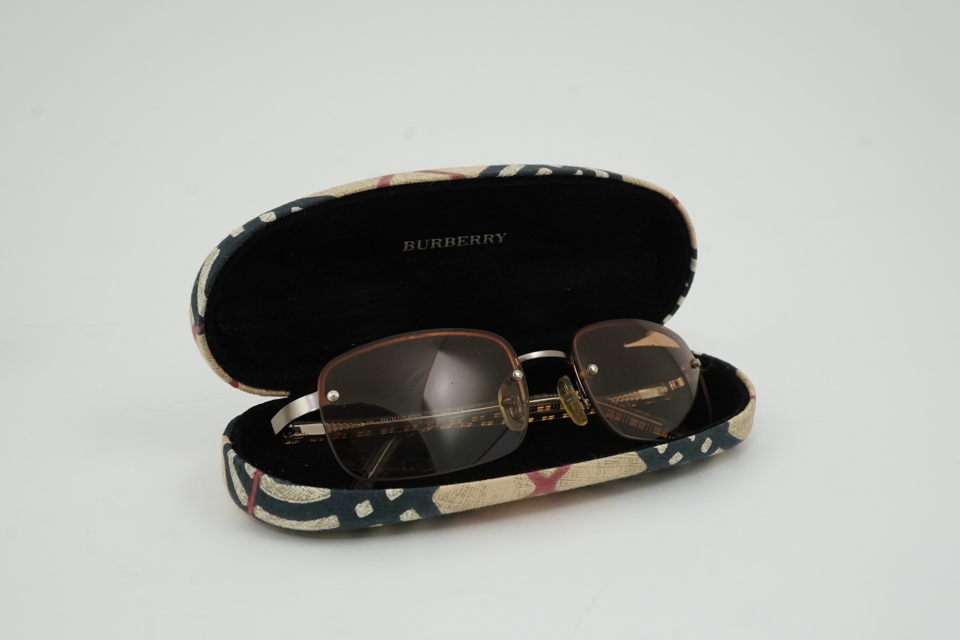 A Burberry brown tartan scarf, sunglasses with case and wallet with original box.